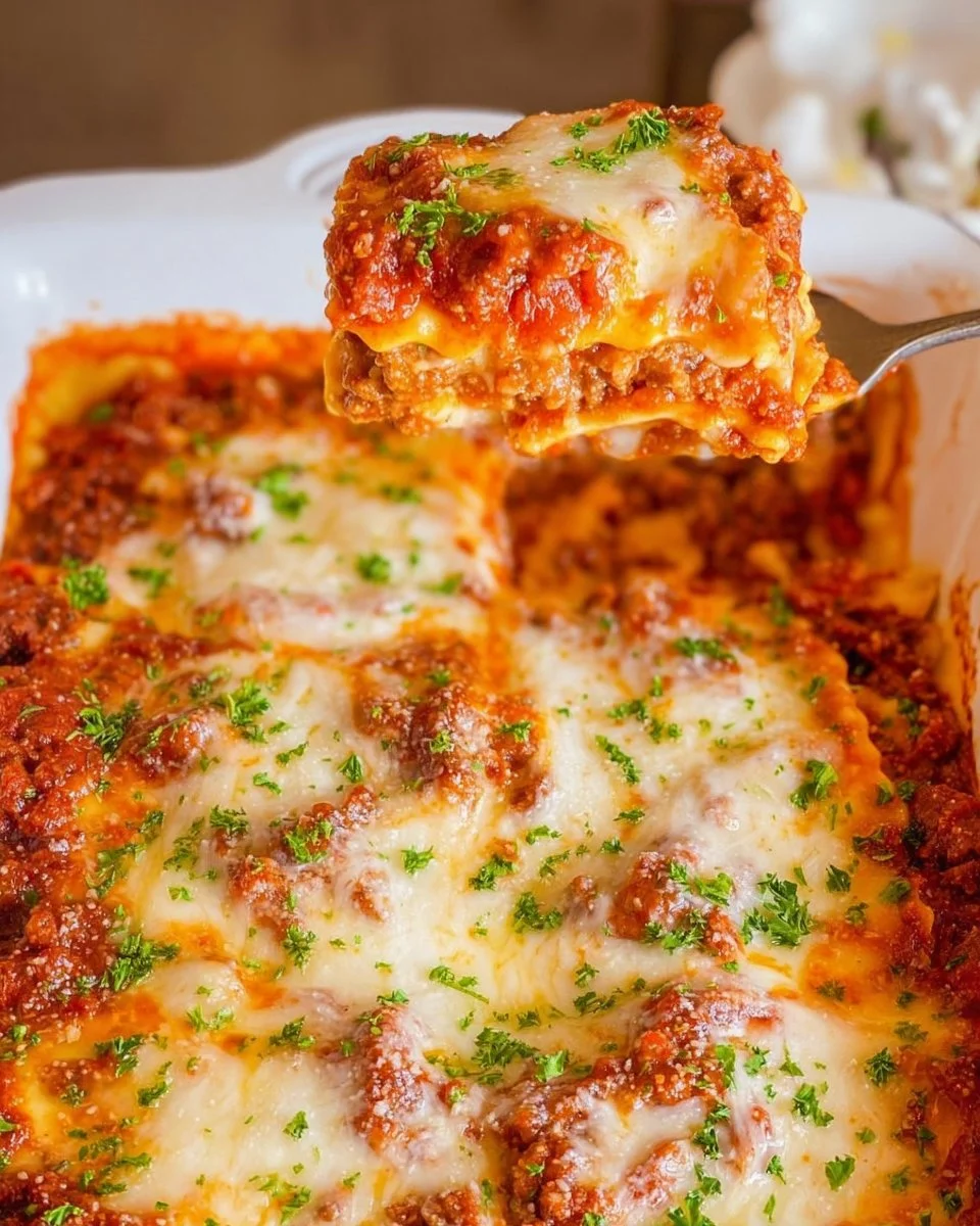 Delicious slice of ravioli lasagna with rich cheese and tomato sauce
